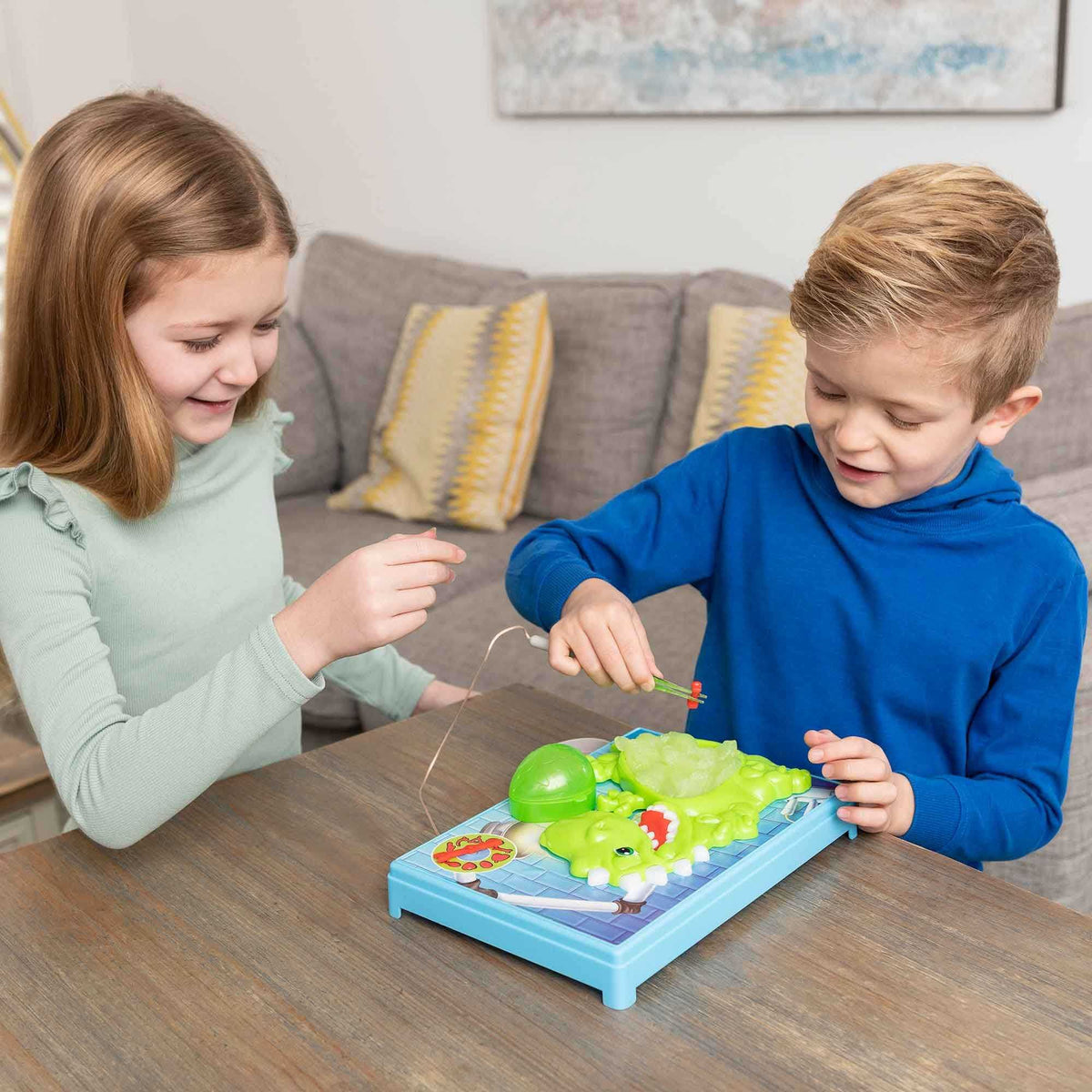 Slime Surgeon Dino Edition Board Game, a dinosaur-themed twist on the classic Shaking Surgeon game. Ideal for kids and adults, it challenges hand-eye coordination and patience with hours of dino-inspired fun.